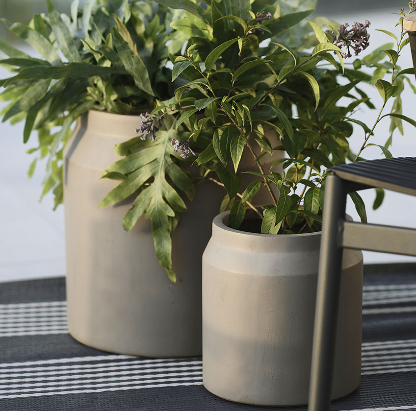 STORSPOVE garden planters Two grey garden planters on a rug