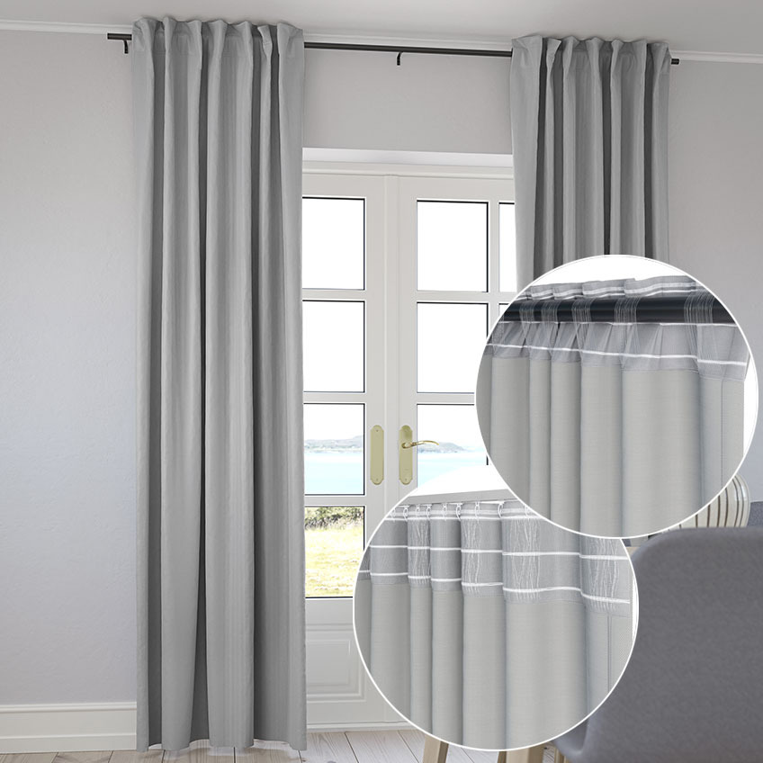 Dining room with long grey curtains 