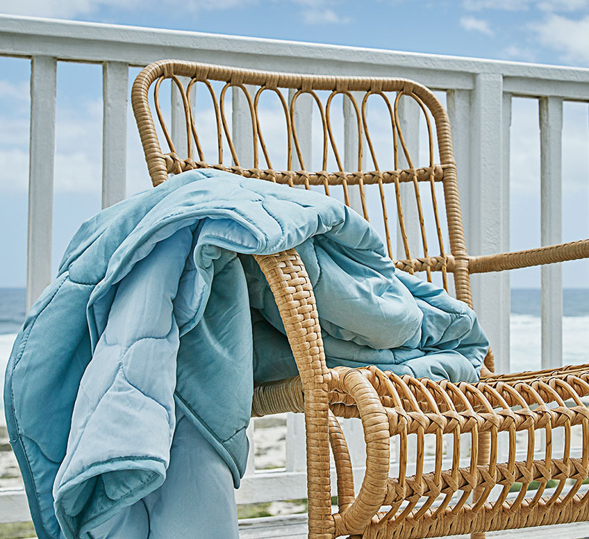 Armchair with blanket on a patio