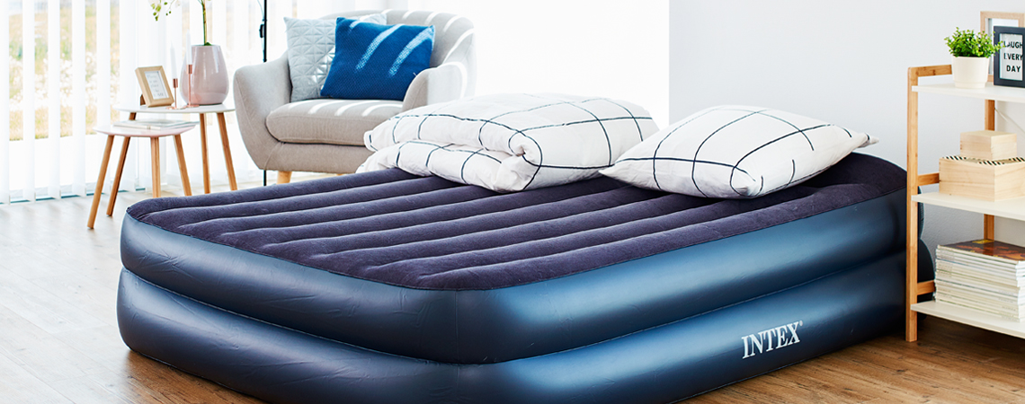 Inflatable bed with pillow and duvet