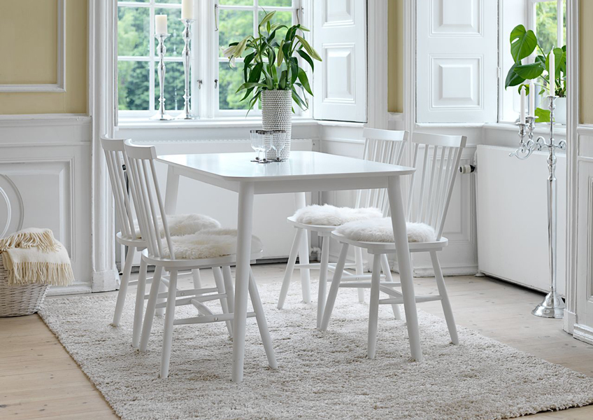 white dining chairs and white dining table from JYSK