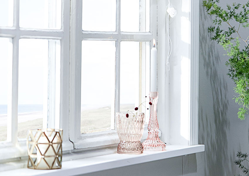 White window panes with beautiful home accessories