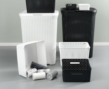 White and black plastic storage boxes